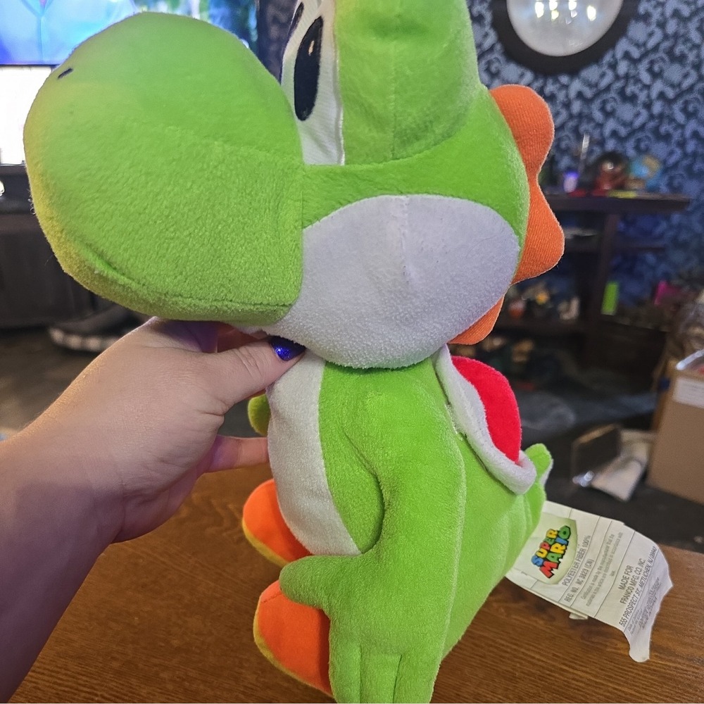 youshi mario brothers plush with pouch under his shell collectiors‎